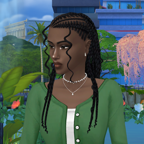 A female Sim wearing Sims 4 CC braided hair poses in a park. She has long, bohemian cornrow style braids and curly face-framing strands.