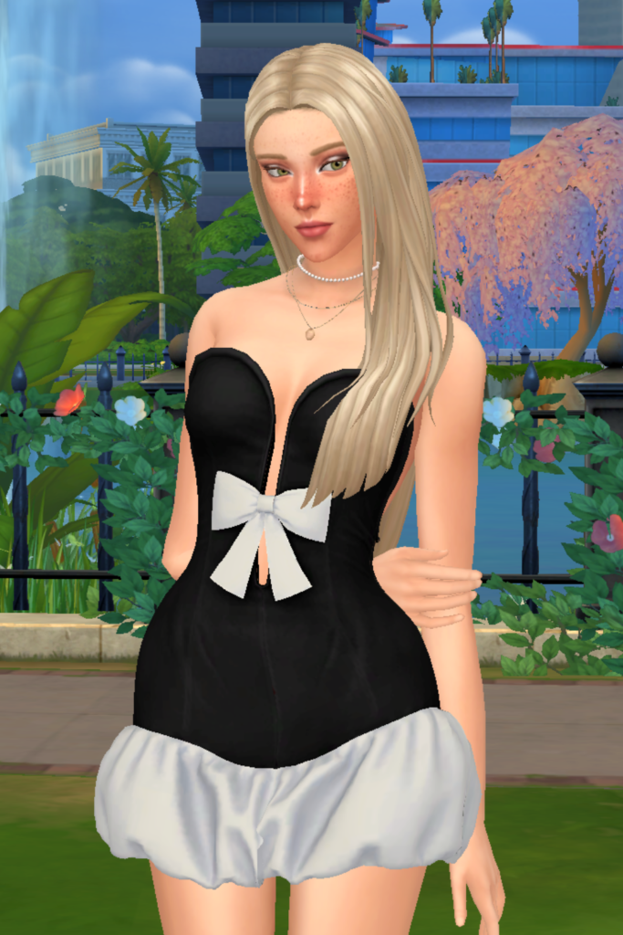 My Favourite Sims 4 CC Mini Dress Finds A blonde female Sim models a Sims 4 CC bubble skirt dress, with a plunging neckline and a big bow in the centre.