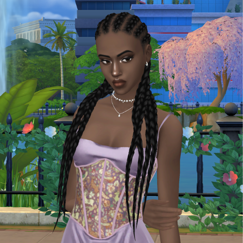 A female Sim wearing Sims 4 CC braided hair poses in a park. She has very long, cornrow style braids tightly braided to her scalp.