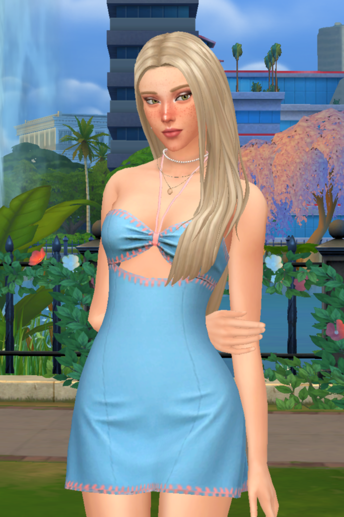 My Favourite Sims 4 CC Mini Dress Finds A blonde female Sim models a Sims 4 CC blue mini dress, with a cutout underneath the bra line and pink stitching details all long the hems
