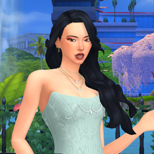 A female Sim wearing Sims 4 CC wavy long hair poses in a park. She has a wavy and voluminous hairstyle with a deep side part and it