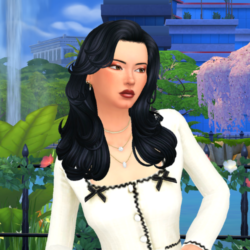A female Sim wearing Sims 4 CC wavy long hair poses in a park. She has a wavy salon blow-out hairstyle look with layers and face framing bangs, showcasing a trendy Sims 4 custom content hairstyle. The look features high-quality Maxis Match texture, perfect for Sims 4 CC CAS and lookbook screenshots.